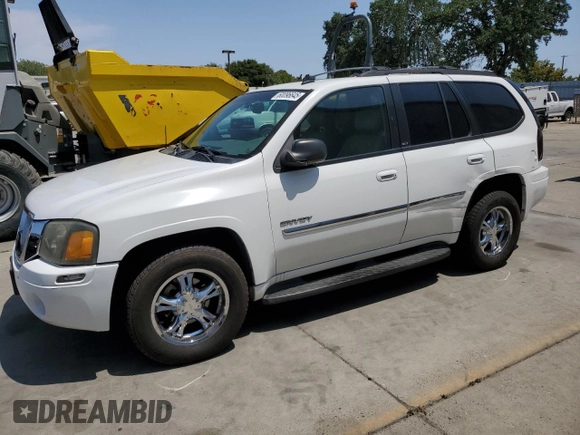 2006 GMC Envoy SLE z VIN 1GKDT13S762345183, wystawiony jako Copart lot #60096645 z przebiegiem 249 658 mil mil oraz Szkoda całkowita • Salvage title. Historia ofert i sprzedaży dostępna na DreamBid. Obrazek 1.
