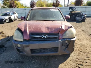 2005 Hyundai Tucson GLS with VIN KM8JN12D75U112964, listed as a Copart auction lot 75042354 with 77,827 mi miles and Salvage Title. Bid and sale history available at carsss.com. Image 5.