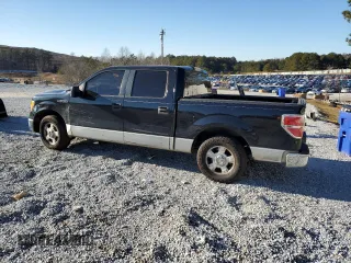 2010 Ford F-150 XL with VIN 1FTEW1C82AFC91191, listed as a Copart auction lot 88750805 with 253,255 mi miles and Salvage Title. Bid and sale history available at carsss.com. Image 2.