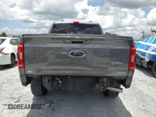 2021 Ford F-150 XL with VIN 1FTFW1E87MFC00633, listed as a Copart auction lot 65318235 with 91,264 mi miles and Salvage title. Bid and sale history available at DreamBid. Image 6.