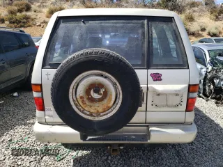 1994 Isuzu Trooper z VIN JACDH58V7R7929502, wystawiony jako Copart lot #70280554 z przebiegiem 243 827 mil mil oraz Tytuł czysty. Historia ofert i sprzedaży dostępna na DreamBid. Obrazek 6.