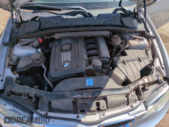 2009 BMW 1 Series 128i z VIN WBAUP73589VK75593, wystawiony jako Copart lot #54456155 z przebiegiem 127 576 mil mil oraz Szkoda całkowita • Salvage title. Historia ofert i sprzedaży dostępna na DreamBid. Obrazek 11.