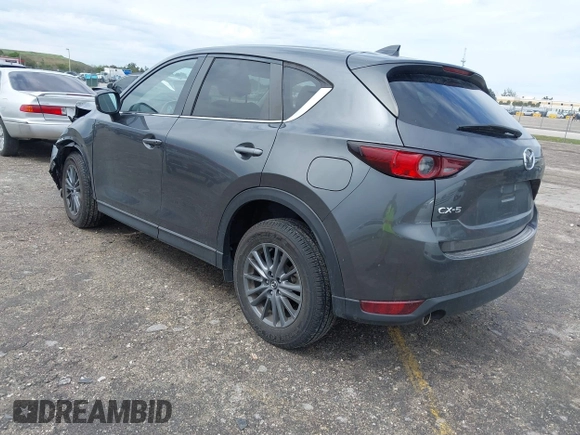 2021 Mazda CX-5 Touring with VIN JM3KFACM1M0461510, listed as a IAAI auction lot 41660439 with 30,352 mi miles. Bid and sale history available at carsss.com. Image 3.