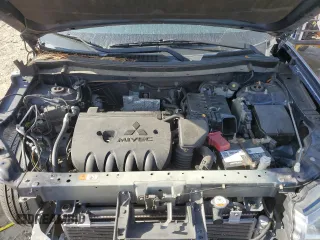 2014 Mitsubishi Outlander SE z VIN JA4AD3A3XEZ011233, wystawiony jako Copart lot #53848985 z przebiegiem 153 539 mil mil oraz Szkoda całkowita • Salvage title. Historia ofert i sprzedaży dostępna na DreamBid. Obrazek 12.