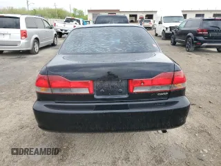 2001 Honda Accord LX z VIN 1HGCG56401A047218, wystawiony jako Copart lot #55053285 z przebiegiem 214 849 mil mil oraz Szkoda całkowita • Salvage title. Historia ofert i sprzedaży dostępna na DreamBid. Obrazek 6.