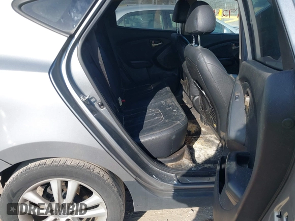 2013 Hyundai Tucson GLS with VIN KM8JU3AC0DU572232, listed as a IAAI auction lot 41724332 with 232,661 mi miles. Bid and sale history available at carsss.com. Image 8.