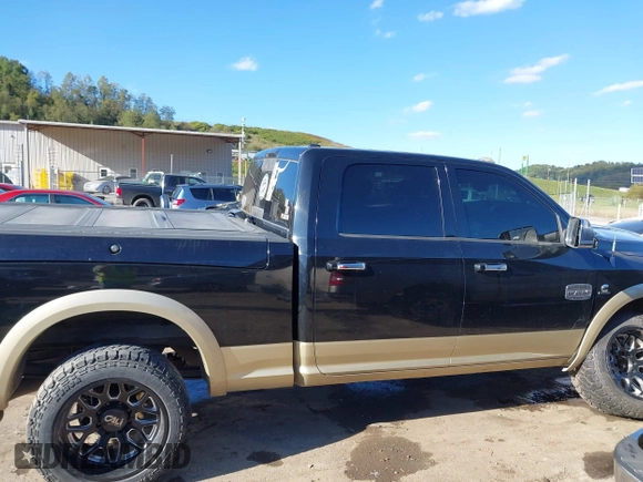2012 Ram 2500 Laramie Longhorn with VIN 3C6UD5GLXCG236343, listed as a IAAI auction lot 40491864 with 131,677 mi miles. Bid and sale history available at carsss.com. Image 13.