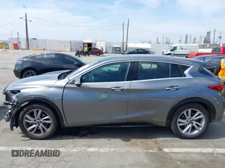 2018 Infiniti QX30 z VIN SJKCH5CP2JA004717, wystawiony jako IAAI lot #42272092 z przebiegiem 129 911 mil mil oraz . Historia ofert i sprzedaży dostępna na DreamBid. Obrazek 15.