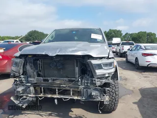 2019 Ram 1500 Laramie with VIN 1C6SRFJT8KN686506, listed as a IAAI auction lot 42499382 with 145,287 mi miles and . Bid and sale history available at DreamBid. Image 13.