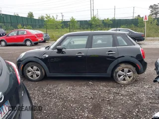 2020 MINI Hardtop 4 Door Cooper with VIN WMWXU7C04L2L58635, listed as a IAAI auction lot 42383785 with 27,160 mi miles and . Bid and sale history available at DreamBid. Image 14.
