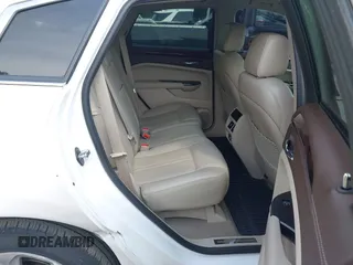 2014 Cadillac SRX Performance Collection with VIN 3GYFNFE34ES677712, listed as a IAAI auction lot 42668059 with 150,135 mi miles and . Bid and sale history available at DreamBid. Image 8.