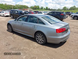 2013 Audi A6 Prestige z VIN WAUHGAFC5DN005495, wystawiony jako IAAI lot #42103621 z przebiegiem 62 268 mil mil oraz . Historia ofert i sprzedaży dostępna na DreamBid. Obrazek 3.