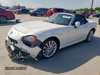 2017 FIAT 124 Spider Elaborazione Abarth z VIN JC1NFAEK0H0105912, wystawiony jako Copart lot #53077885 z przebiegiem 72 652 mil mil oraz Szkoda całkowita • Salvage title. Historia ofert i sprzedaży dostępna na DreamBid. Obrazek 1.