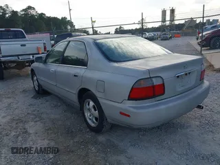 1997 Honda Accord Special Edition with VIN 1HGCD560XVA267719, listed as a IAAI auction lot 41680625 with 325,852 mi miles and . Bid and sale history available at carsss.com. Image 3.
