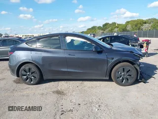 2025 Tesla Model Y Long Range with VIN 7SAYGDED4SF226776, listed as a IAAI auction lot 41514317 with 1,636 mi miles and . Bid and sale history available at DreamBid. Image 14.