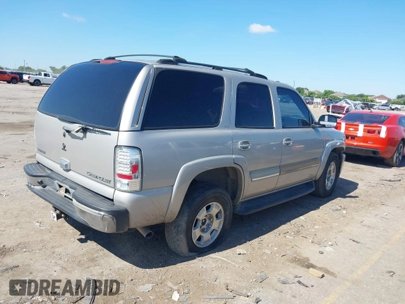 2004 Chevrolet Tahoe LT with VIN 1GNEC13Z54R268368, listed as a IAAI auction lot 42245314 with 182,977 mi miles and . Bid and sale history available at DreamBid. Image 4.
