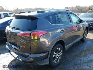 2016 Toyota RAV4 LE with VIN 2T3ZFREV7GW305998, listed as a IAAI auction lot 41869024 with 163,463 mi miles. Bid and sale history available at carsss.com. Image 4.
