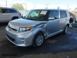 2015 Scion xB with VIN JTLZE4FE4FJ076444, listed as a IAAI auction lot 42025005 with 76,918 mi miles. Bid and sale history available at carsss.com. Image 2.