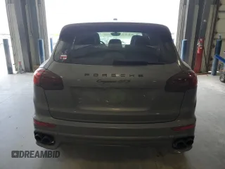 2016 Porsche Cayenne GTS с VIN WP1AD2A2XGLA80001, выставлен на аукционе Copart как лот 56706455 с пробегом 71 816 миль миль и Списание • Salvage title. История ставок и продаж доступна на DreamBid. Изображение 6.