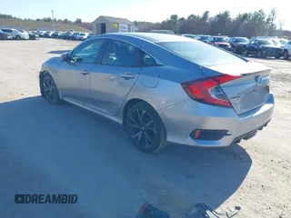 2019 Honda Civic Sport with VIN 2HGFC2F8XKH602463, listed as a IAAI auction lot 41966052 with 95,416 mi miles and . Bid and sale history available at DreamBid. Image 3.