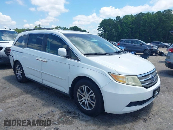 2011 Honda Odyssey EX-L with VIN 5FNRL5H6XBB002461, listed as a IAAI auction lot 42662720 with 145,672 mi miles and . Bid and sale history available at DreamBid. Image 1.