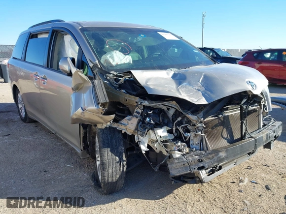 2015 Toyota Sienna XLE with VIN 5TDYK3DC8FS547056, listed as a IAAI auction lot 41387793 with 140,767 mi miles and . Bid and sale history available at DreamBid. Image 1.