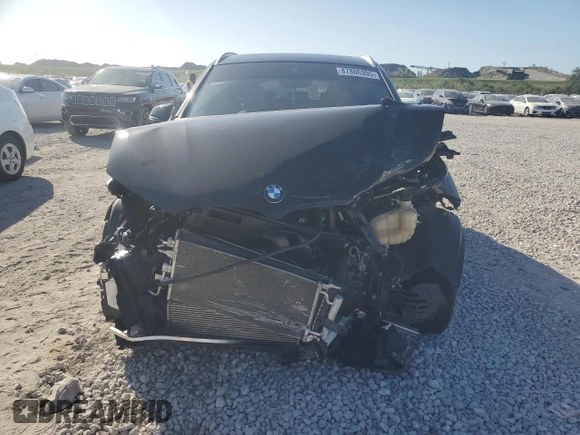 2022 BMW X1 sDrive28i with VIN WBXJG7C03N5U52669, listed as a Copart auction lot 87806305 with 27,609 mi miles and Salvage Title. Bid and sale history available at carsss.com. Image 5.