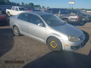 2006 Volkswagen Jetta z VIN 3VWMJ81K56M662592, wystawiony jako IAAI lot #41987335 z przebiegiem 162 957 mil mil oraz . Historia ofert i sprzedaży dostępna na DreamBid. Obrazek 1.