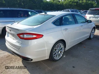 2014 Ford Fusion Titanium with VIN 3FA6P0K95ER128961, listed as a IAAI auction lot 42750668 with 197,188 mi miles and . Bid and sale history available at DreamBid. Image 4.