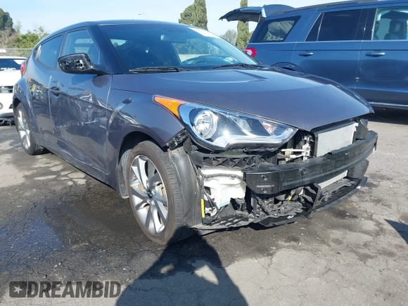 2016 Hyundai Veloster z VIN KMHTC6AD1GU286674, wystawiony jako IAAI lot #41627128 z przebiegiem 71 617 mil mil oraz . Historia ofert i sprzedaży dostępna na DreamBid. Obrazek 1.