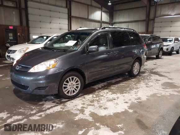 2009 Toyota Sienna XLE with VIN 5TDBK22C29S028110, listed as a IAAI auction lot 41496169 with 253,057 mi miles and . Bid and sale history available at DreamBid. Image 2.