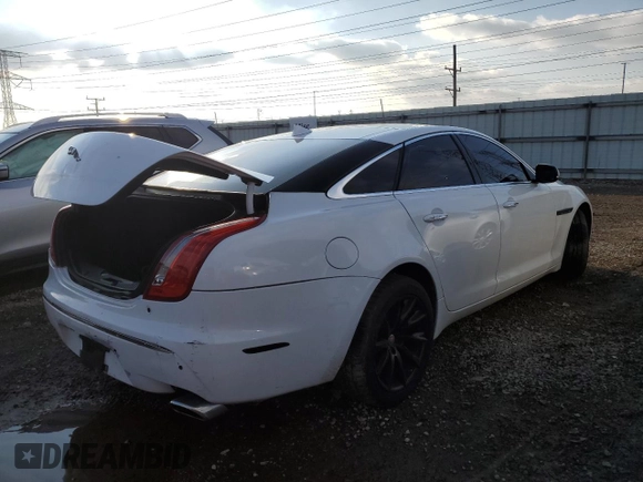 2013 Jaguar XJ with VIN SAJWJ1CD6D8V50968, listed as a Copart auction lot 79880924 with 136,280 mi miles and Salvage Title. Bid and sale history available at carsss.com. Image 3.