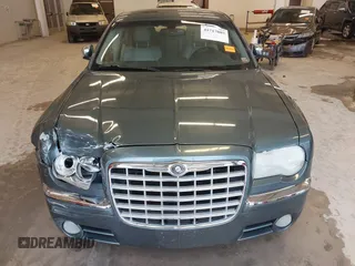 2005 Chrysler 300 with VIN 2C3JA63H95H111269, listed as a IAAI auction lot 41717805 with 102,740 mi miles. Bid and sale history available at carsss.com. Image 12.