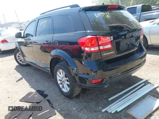 2015 Dodge Journey SXT with VIN 3C4PDCBG7FT605174, listed as a IAAI auction lot 42465723 with 172,130 mi miles and . Bid and sale history available at DreamBid. Image 3.