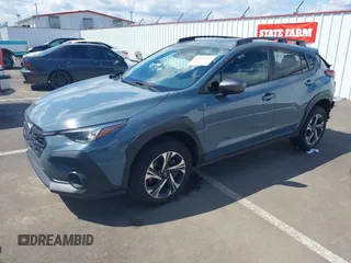 2024 Subaru Crosstrek Premium with VIN JF2GUADC6R8306021, listed as a IAAI auction lot 42078539 with 28,497 mi miles and . Bid and sale history available at DreamBid. Image 2.