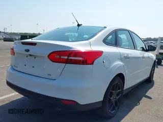 2016 Ford Focus SE with VIN 1FADP3F20GL329898, listed as a IAAI auction lot 42844995 with 20,485 mi miles and . Bid and sale history available at DreamBid. Image 4.