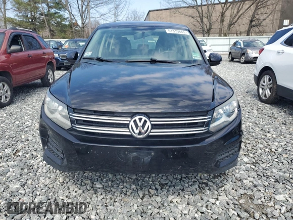 2013 Volkswagen Tiguan SEL with VIN WVGBV3AX1DW581790, listed as a Copart auction lot 51319665 with 194,237 mi miles and Clean Title. Bid and sale history available at DreamBid. Image 5.