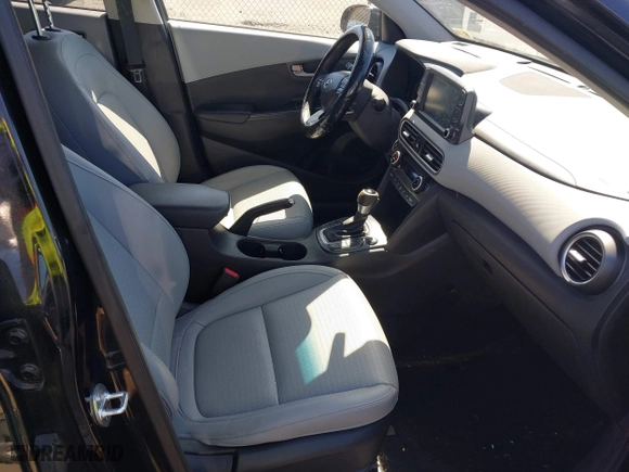 2018 Hyundai Kona Ultimate with VIN KM8K5CA50JU118013, listed as a IAAI auction lot 41863926 with 138,772 mi miles. Bid and sale history available at carsss.com. Image 5.
