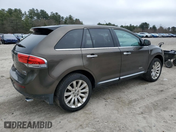 2011 Lincoln MKX z VIN 2LMDJ8JK4BBJ02626, wystawiony jako Copart lot #49161525 z przebiegiem 171 025 mil mil oraz Czysty tytuł • Clean title. Historia ofert i sprzedaży dostępna na DreamBid. Obrazek 3.