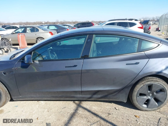 2023 Tesla Model 3 with VIN 5YJ3E1EA3PF678825, listed as a IAAI auction lot 41283153 with 8,607 mi miles. Bid and sale history available at carsss.com. Image 14.