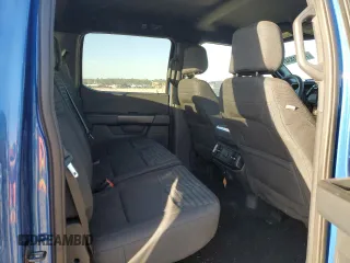 2023 Ford F-150 XL with VIN 1FTFW1E51PKF30933, listed as a Copart auction lot 76121834 with 26,267 mi miles and Salvage Title. Bid and sale history available at carsss.com. Image 10.