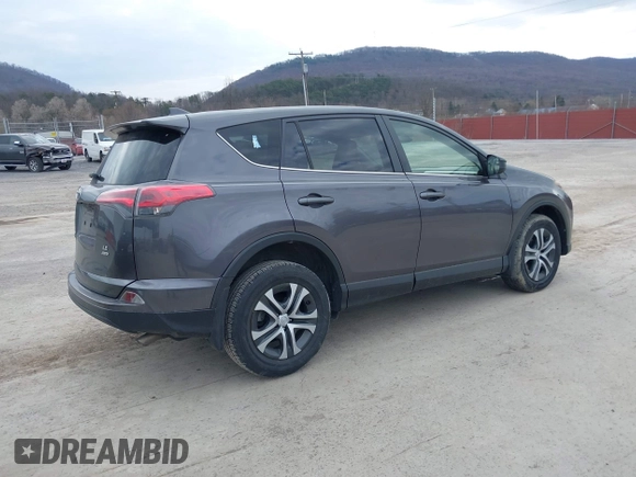 2018 Toyota RAV4 LE with VIN JTMBFREV4JJ742428, listed as a IAAI auction lot 41912813 with 114,159 mi miles. Bid and sale history available at carsss.com. Image 4.