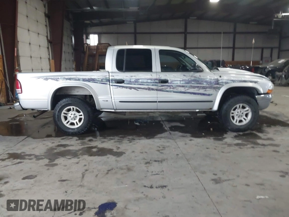 2004 Dodge Dakota SLT with VIN 1D7HG48N64S523528, listed as a IAAI auction lot 41199575 with 261,239 mi miles. Bid and sale history available at carsss.com. Image 13.