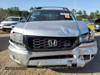 2012 Honda Ridgeline Sport with VIN 5FPYK1F77CB456114, listed as a Copart auction lot 75874274 with 212,379 mi miles and Salvage Title. Bid and sale history available at carsss.com. Image 5.