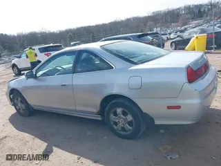 2001 Honda Accord Cpe EX with VIN 1HGCG31571A005892, listed as a IAAI auction lot 42022588 with 202,497 mi miles. Bid and sale history available at carsss.com. Image 15.