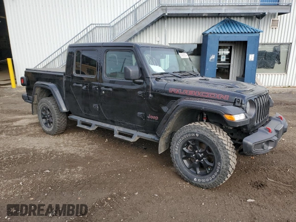 2022 Jeep Gladiator Rubicon with VIN 1C6JJTBG6NL118998, listed as a Copart auction lot 81451814 with 61,125 mi miles and Salvage title. Bid and sale history available at DreamBid. Image 4.