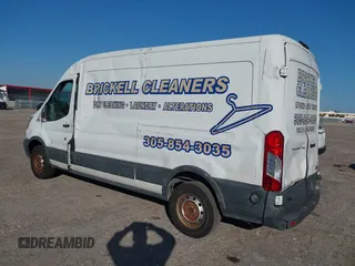2015 Ford Transit Cargo with VIN 1FTNE2CM9FKA64133, listed as a IAAI auction lot 41312926 with 117,176 mi miles and . Bid and sale history available at carsss.com. Image 3.