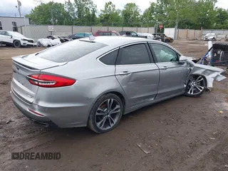 2020 Ford Fusion Titanium with VIN 3FA6P0D98LR115437, listed as a IAAI auction lot 42331052 with 127,346 mi miles and . Bid and sale history available at DreamBid. Image 4.