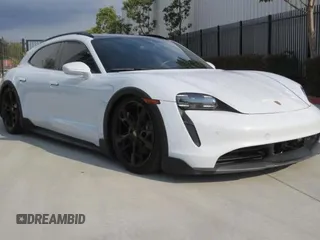 2022 Porsche Taycan 4 z VIN WP0BA2Y19NSA67581, wystawiony jako Copart lot #59634035 z przebiegiem 6 775 mil mil oraz Szkoda całkowita • Salvage title. Historia ofert i sprzedaży dostępna na DreamBid. Obrazek 1.