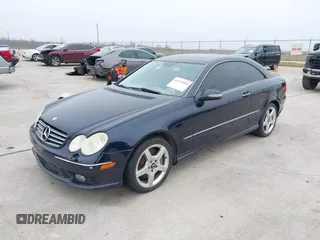 2005 Mercedes-Benz CLK 500 with VIN WDBTJ75J05F145370, listed as a IAAI auction lot 41531094 with 107,162 mi miles and . Bid and sale history available at DreamBid. Image 2.